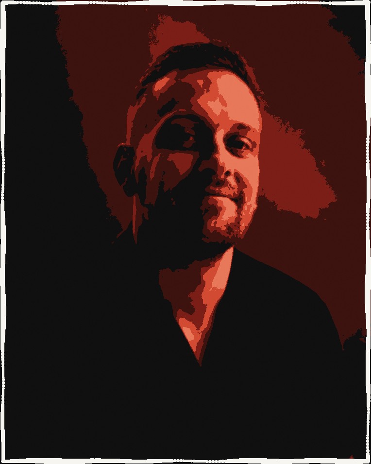 Stylized black-and-red portrait of John Farmer, founder and principal writer of FieldDesk Production Media, half-lit against a dark ground.